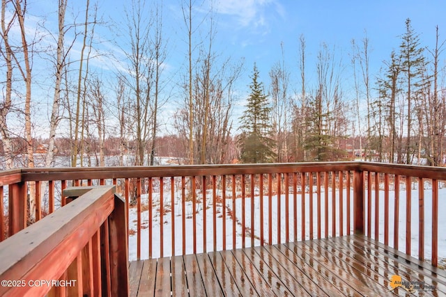 view of snow covered deck