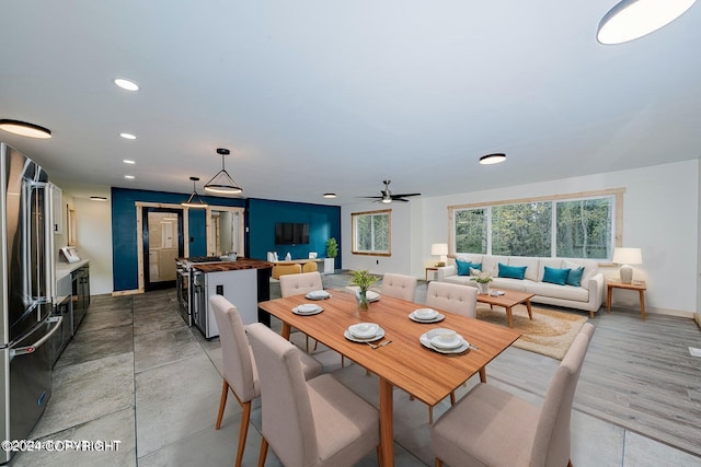 dining area featuring ceiling fan