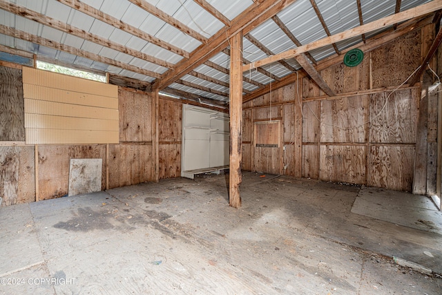 interior space featuring vaulted ceiling