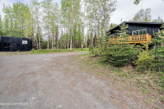 view of yard with a deck