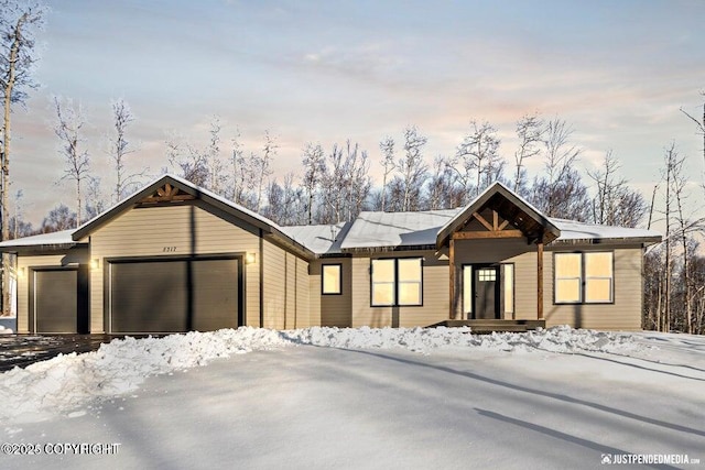 view of front of home with a garage