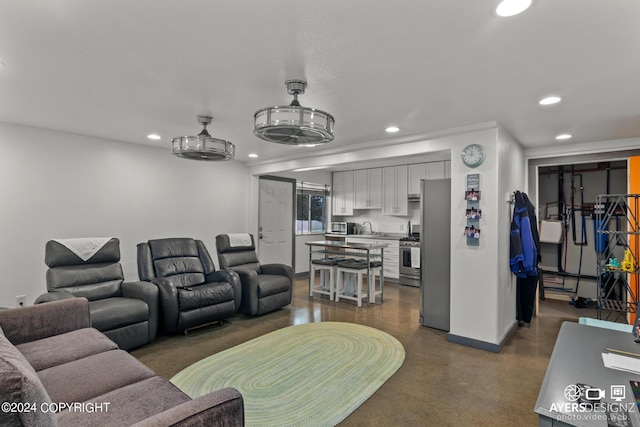 living room featuring sink