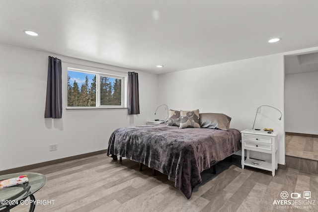 bedroom with light wood-type flooring