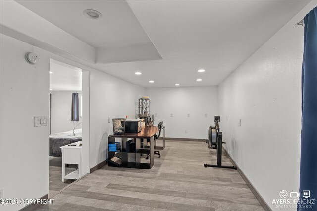 home office with light wood-type flooring