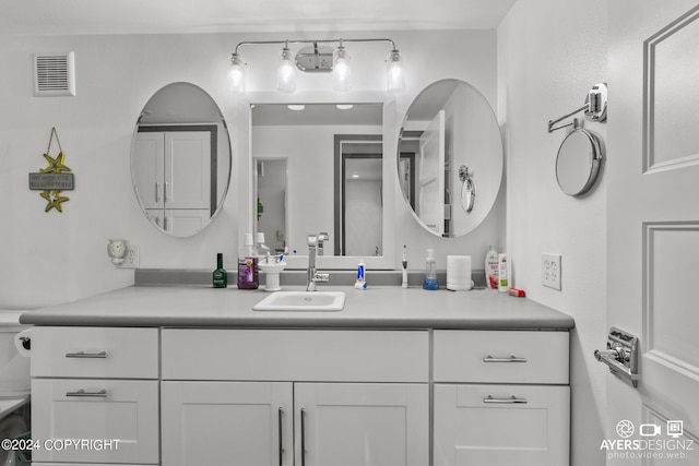 bathroom featuring vanity