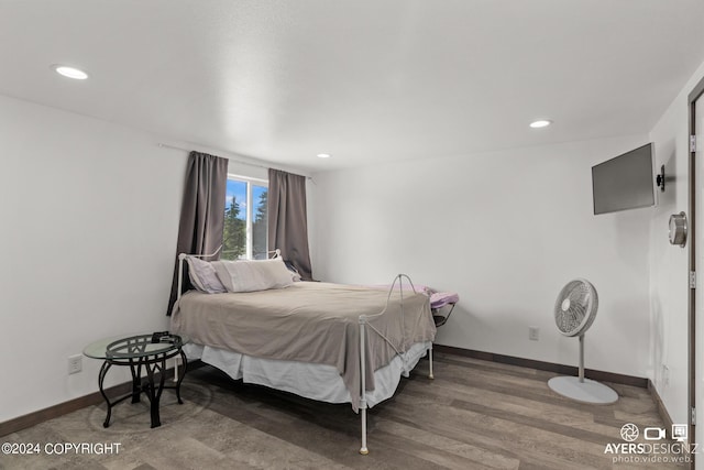 bedroom featuring hardwood / wood-style flooring