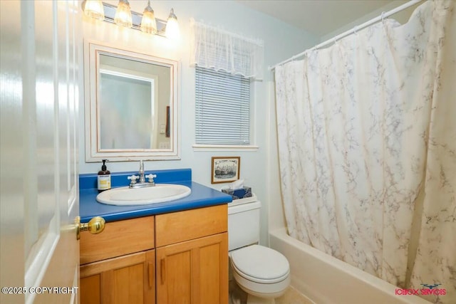 full bathroom featuring toilet, vanity, and shower / bath combination with curtain