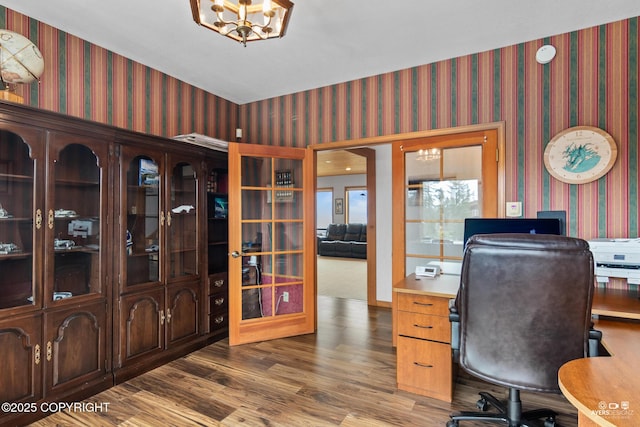 office area featuring wood-type flooring and a notable chandelier