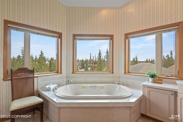 bathroom featuring tiled bath