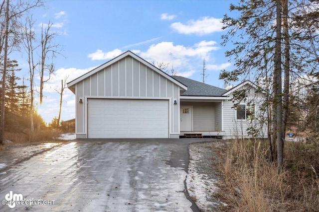 view of front of property with a garage