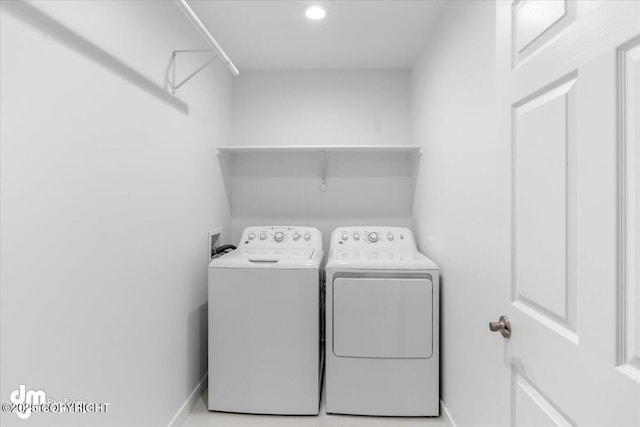 laundry area featuring washer and clothes dryer