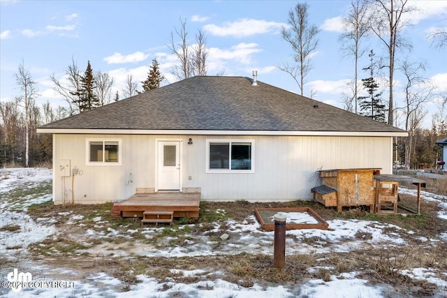 view of snow covered house