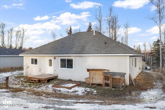 view of snow covered house