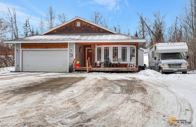 view of front of property featuring a garage