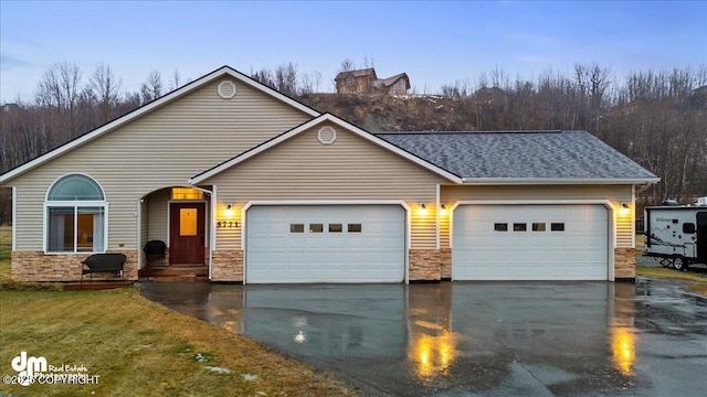 view of front of home featuring a garage