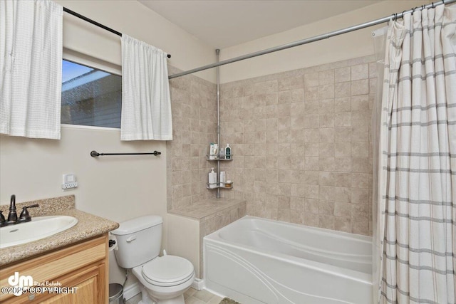 full bathroom with shower / bath combo with shower curtain, vanity, and toilet