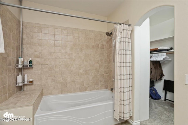 bathroom featuring shower / tub combo with curtain