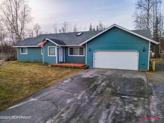 single story home with a garage