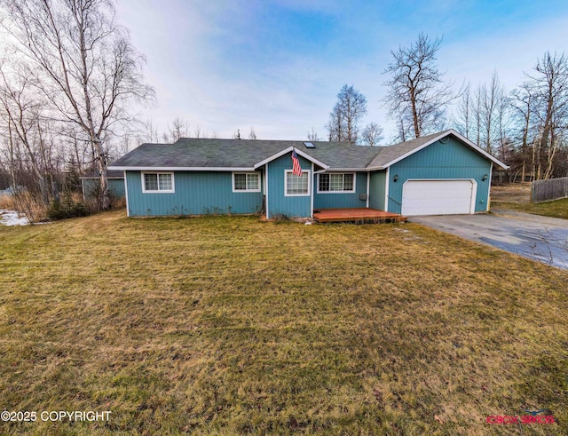 ranch-style house with a front lawn and a garage