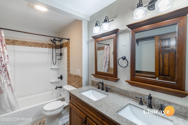 full bathroom with vanity, toilet, and shower / tub combo