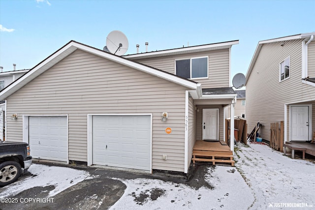 view of front of home with a garage