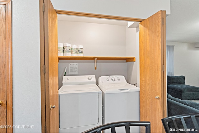 washroom with washer and clothes dryer