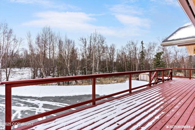 view of snow covered deck