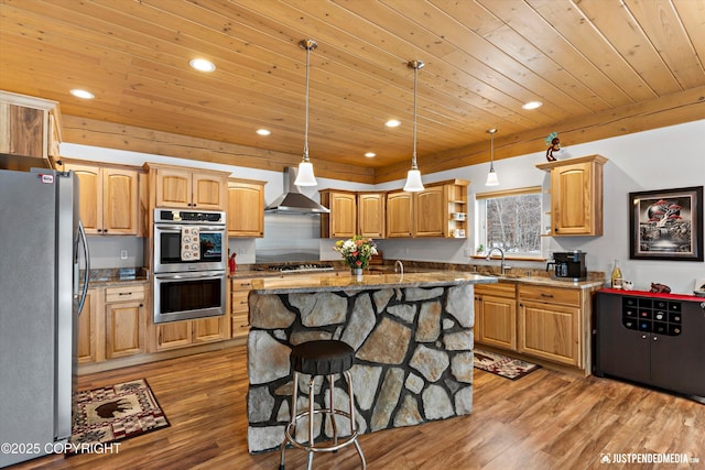 kitchen featuring wood finished floors, recessed lighting, stainless steel appliances, wood ceiling, and wall chimney exhaust hood