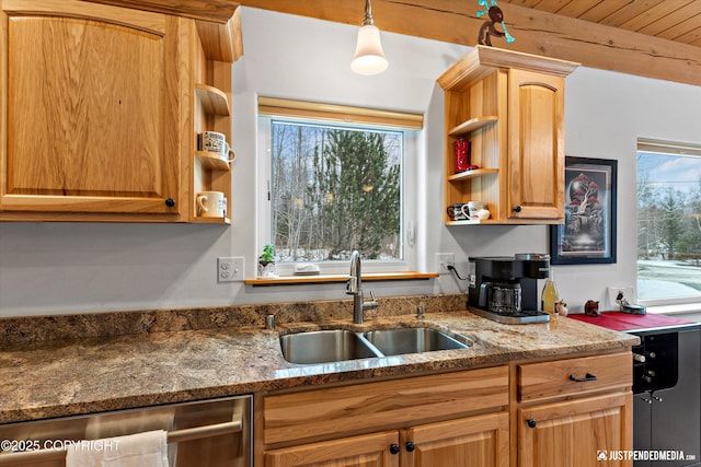 kitchen with a sink, dishwasher, dark stone counters, and open shelves