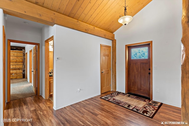 entryway with wood ceiling, vaulted ceiling with beams, baseboards, and wood finished floors