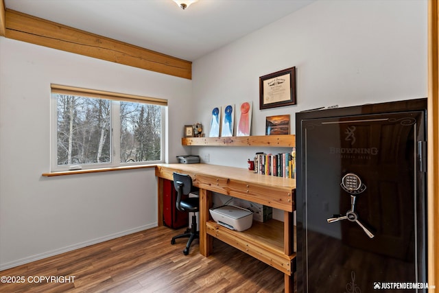 office space with wood finished floors and baseboards