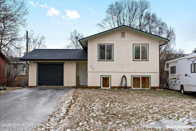 tri-level home with a garage