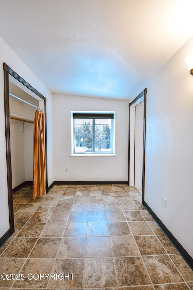 unfurnished bedroom featuring a closet