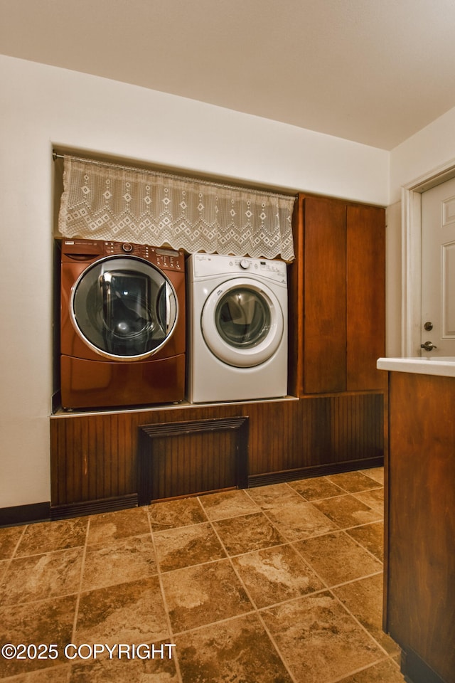 laundry area with washer and clothes dryer