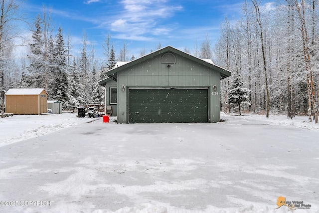 view of snow covered garage