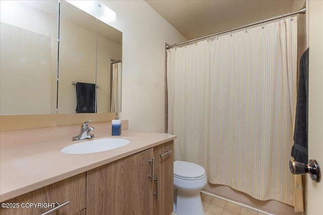 full bathroom with vanity, toilet, and shower / bath combo with shower curtain