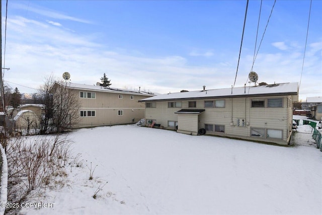 view of snow covered house