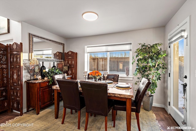 dining area featuring hardwood / wood-style flooring