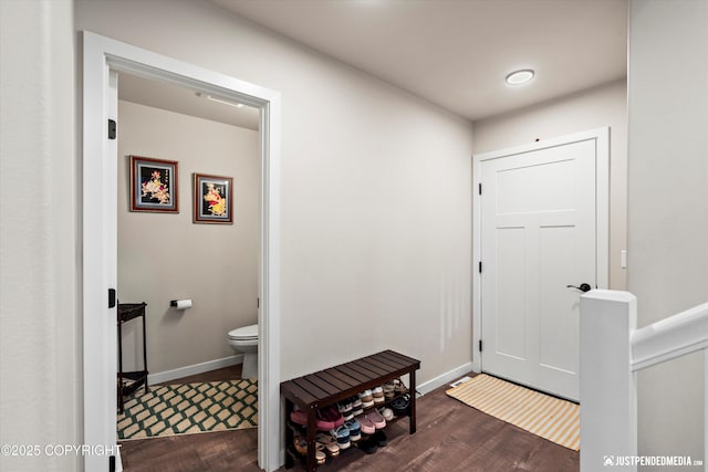 interior space with dark hardwood / wood-style flooring