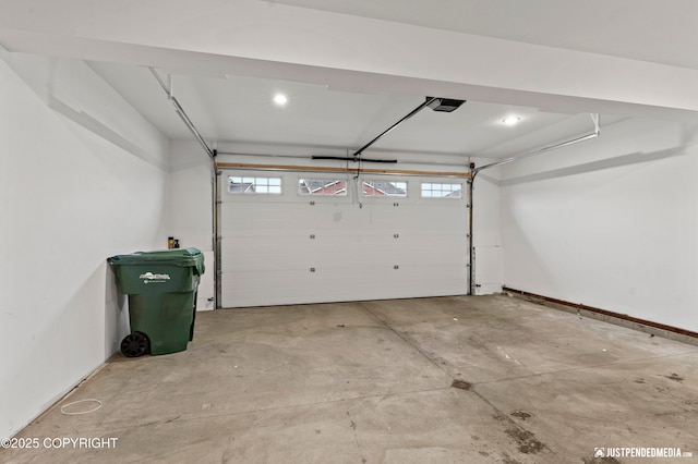 garage featuring a garage door opener