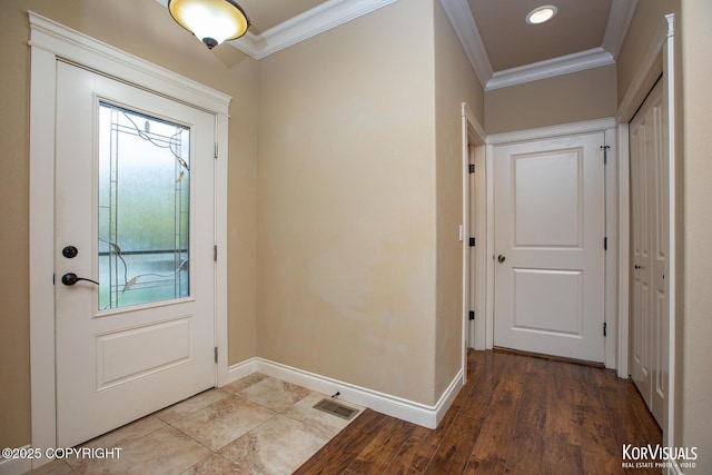 interior space with crown molding and hardwood / wood-style floors