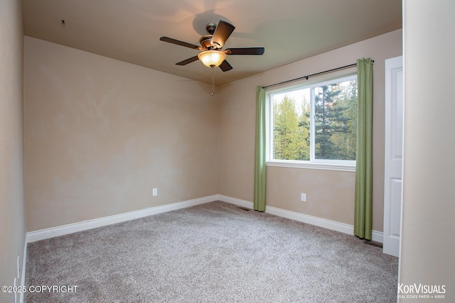 unfurnished room featuring carpet flooring and ceiling fan