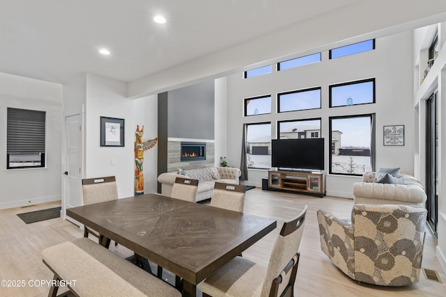 dining space with light wood-type flooring