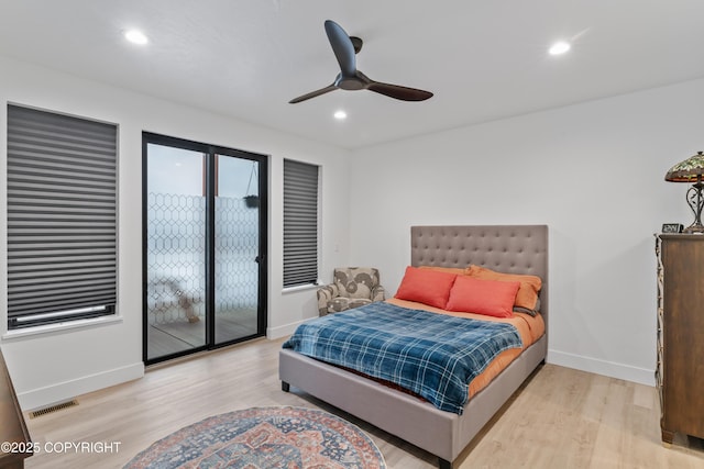 bedroom featuring access to exterior, ceiling fan, and light wood-type flooring