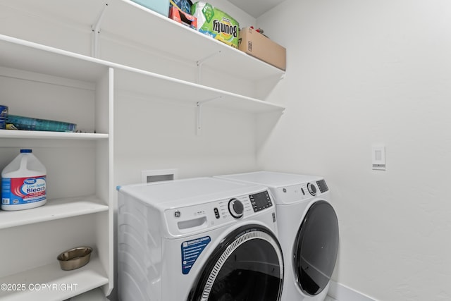 laundry room with separate washer and dryer