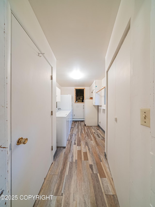 hall with light wood-type flooring