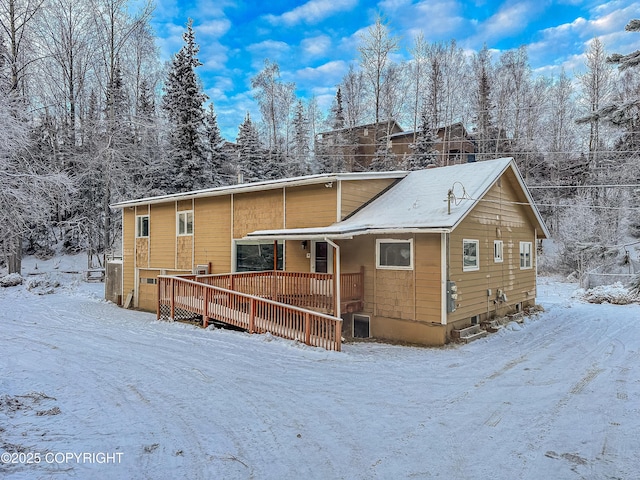 view of snow covered property