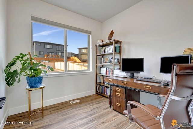 office area with light wood-type flooring