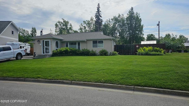 view of front of home featuring a front lawn