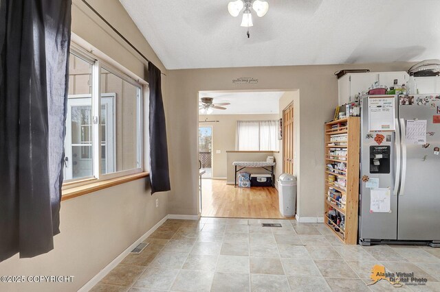 5450 E Alder Dr, Wasilla, AK 99654 - corridor featuring light tile patterned floors, baseboards, and visible vents